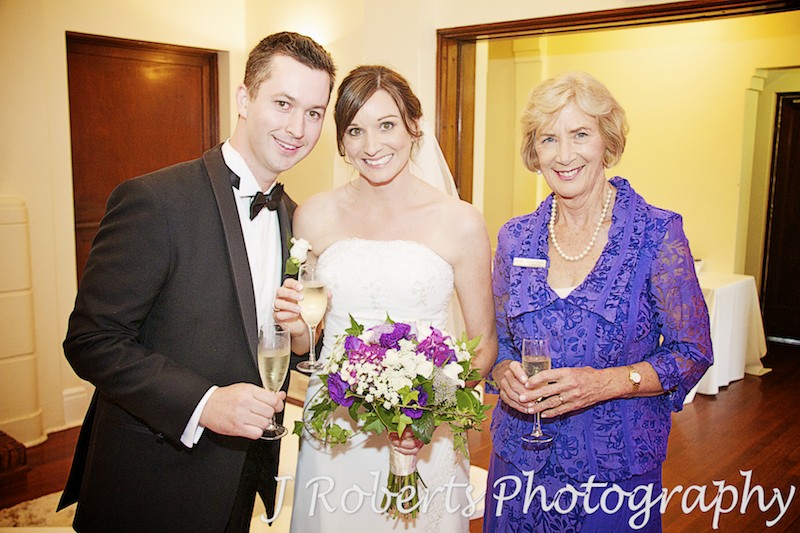 bride and groom with celebrant - wedding photography sydney